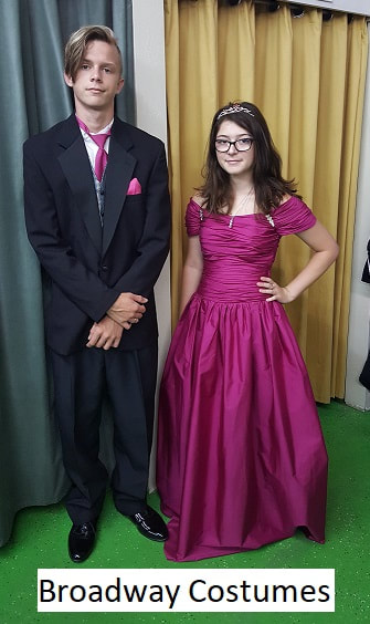 Picture of our Tuxedo suit and a prom gown for rent